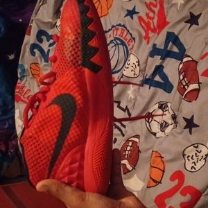 Red and black nike size 4